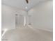 Bright bedroom featuring mirrored closet doors and a view into the hallway at 1736 E Bluefield Ave, Phoenix, AZ 85022