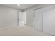 Bright bedroom with neutral carpet and large closet doors, offering ample storage space at 1736 E Bluefield Ave, Phoenix, AZ 85022