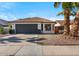 Charming single-story home with a well-maintained front yard and attached two-car garage at 1736 E Bluefield Ave, Phoenix, AZ 85022