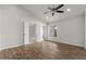 Bright main bedroom boasts vaulted ceilings, hardwood floors, and an adjoining walk-in closet at 1736 E Bluefield Ave, Phoenix, AZ 85022