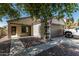 Charming single-story home featuring a well-maintained front yard and attached two-car garage at 17611 W Watson Ln, Surprise, AZ 85388