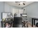 Office space featuring dual monitors, a modern desk setup, and comfortable seating for an optimal work environment at 17611 W Watson Ln, Surprise, AZ 85388