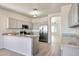 Modern kitchen with stainless steel appliances, granite countertops, and ample cabinet space for storage at 18371 W Capistrano Ave, Goodyear, AZ 85338