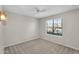 Cozy bedroom with a large window and ceiling fan, great natural light at 18416 N Spanish Garden Dr, Sun City West, AZ 85375