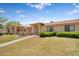 Well-maintained home with green grass and desert landscaping at 18416 N Spanish Garden Dr, Sun City West, AZ 85375