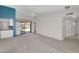 Spacious living room with sliding doors to the patio at 18416 N Spanish Garden Dr, Sun City West, AZ 85375