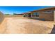 Expansive backyard with block fence offering privacy and space for outdoor activities at 18908 W Montebello Ave, Litchfield Park, AZ 85340