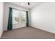 Cozy bedroom with neutral carpet, window and natural light at 18908 W Montebello Ave, Litchfield Park, AZ 85340