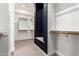 Organized walk-in closet with custom shelving and ample hanging space at 18908 W Montebello Ave, Litchfield Park, AZ 85340