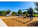 Community playground with swings, climbing wall, and well-maintained surroundings at 18908 W Montebello Ave, Litchfield Park, AZ 85340