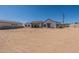 Rear exterior view featuring ample outdoor space, and modern architecture at 2095 N 77Th Pl, Mesa, AZ 85207