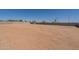 Large backyard, ready for landscaping, gardening, or outdoor activities at 2095 N 77Th Pl, Mesa, AZ 85207