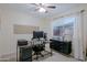 Functional home office space equipped with a computer setup, storage, and natural light at 21061 N 33Rd Dr, Phoenix, AZ 85027