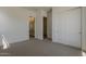 Bedroom with double closets and ensuite bathroom at 21276 W Mariposa St, Buckeye, AZ 85396