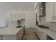 Spacious kitchen boasting an island, modern appliances, and tons of counter space at 21276 W Mariposa St, Buckeye, AZ 85396