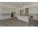 Modern kitchen featuring an island, stainless appliances, and stylish countertops at 21276 W Mariposa St, Buckeye, AZ 85396