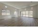 Expansive living room with walls of windows that bring the outside in at 21276 W Mariposa St, Buckeye, AZ 85396