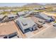 A neighborhood view with mountain views in the background and lush landscaping at 21427 W Meadowbrook Ave, Buckeye, AZ 85396