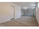 Spacious two car garage with a secure side entrance at 21427 W Meadowbrook Ave, Buckeye, AZ 85396