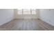 Living room with tile floors and multiple windows at 21427 W Meadowbrook Ave, Buckeye, AZ 85396