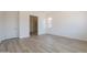 Bright bedroom with tile floors and a walk-in shower at 21427 W Meadowbrook Ave, Buckeye, AZ 85396