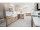 Bright kitchen featuring stainless steel appliances, wood cabinets, and a farmhouse sink at 21632 N 48Th St, Phoenix, AZ 85054