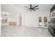 Open living space with modern fixtures, tiled floors, and doors leading to outdoor space at 21632 N 48Th St, Phoenix, AZ 85054