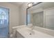 Bathroom featuring a sink with a large mirror and a doorway with a view into another room at 2333 E Southern Ave # 1023, Tempe, AZ 85282