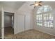 Bright bedroom with a vaulted ceiling, a large window, and tile floors at 2333 E Southern Ave # 1023, Tempe, AZ 85282