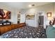A cozy bedroom featuring stylish decor, natural light, and an en-suite bathroom at 2753 E Fossil Ridge Rd, Phoenix, AZ 85050