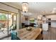 Open-concept living space with a dining area and a kitchen, perfect for entertaining at 2753 E Fossil Ridge Rd, Phoenix, AZ 85050