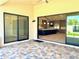 Back patio overlooking seamless transition to the kitchen and interior living space at 3021 N 47Th St, Phoenix, AZ 85018