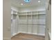 Walk-in closet featuring custom shelving at 3021 N 47Th St, Phoenix, AZ 85018