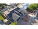 New construction featuring a sleek, dark roof, multiple dormers, set in a suburban landscape at 3028 N 47Th St, Phoenix, AZ 85018