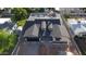A well-designed house with a dark roof featuring eye-catching dormers, set in a cozy neighborhood at 3028 N 47Th St, Phoenix, AZ 85018