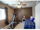 Comfortable bedroom featuring neutral walls, exercise equipment, and good natural light at 3203 W Libby St, Phoenix, AZ 85053