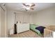 Cozy bedroom with ceiling fan, natural light, and comfortable furnishings at 3203 W Libby St, Phoenix, AZ 85053
