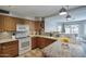 Well-equipped kitchen with plenty of counter space, stainless steel appliances, and updated fixtures at 3203 W Libby St, Phoenix, AZ 85053