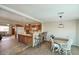 Open-concept living space with kitchen, bar seating, and dining area; ideal for entertaining at 3203 W Libby St, Phoenix, AZ 85053