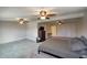 Generous main bedroom with ceiling fan, neutral carpet, and plenty of space at 3203 W Libby St, Phoenix, AZ 85053