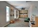 Spacious playroom featuring natural light, ceiling fan, built-in storage and play area at 3203 W Libby St, Phoenix, AZ 85053