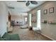 Bright playroom area with ceiling fan, natural light, and -friendly features at 3203 W Libby St, Phoenix, AZ 85053