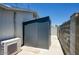 Outdoor shot of backyard shed with modern minimalist design and AC unit at 3203 W Libby St, Phoenix, AZ 85053
