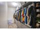 Walk-in closet featuring custom shelving and ample storage at 3203 W Libby St, Phoenix, AZ 85053