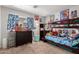 Fun bedroom with bunk beds and colorful decor, creating a playful and lively atmosphere at 3438 S Bowman Rd, Apache Junction, AZ 85119
