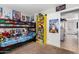 Bedroom with bunk beds, shelving and fun decor offering a vibrant and energetic space at 3438 S Bowman Rd, Apache Junction, AZ 85119