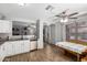 Kitchen showcasing stainless steel dishwasher, white cabinets, and a breakfast nook nearby at 3438 S Bowman Rd, Apache Junction, AZ 85119