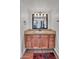 Bathroom featuring a light vanity with ample storage, a mirror, and neutral countertop and flooring at 3500 N Hayden Rd # 203, Scottsdale, AZ 85251