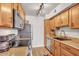 Cozy kitchen featuring stylish cabinets and stainless-steel appliances at 3500 N Hayden Rd # 203, Scottsdale, AZ 85251