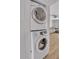 Convenient laundry closet featuring stackable Samsung washer and dryer at 3500 N Hayden Rd # 203, Scottsdale, AZ 85251
